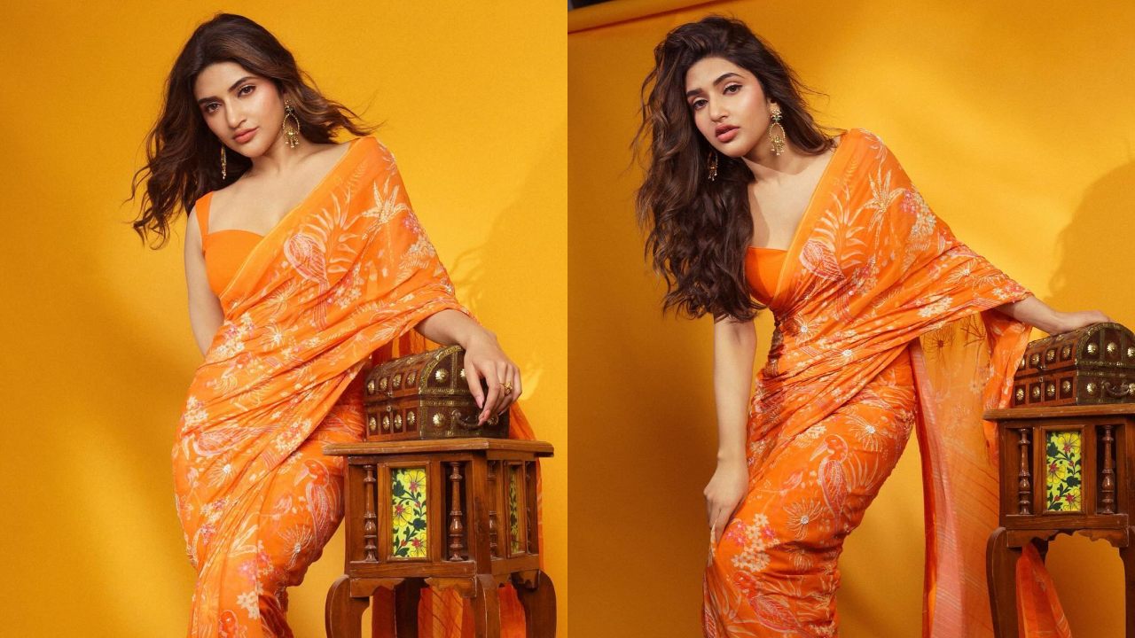[Photos] Sreeleela Looks Dripping In Tangerine Printed Saree With Modern Blouse Design 900637