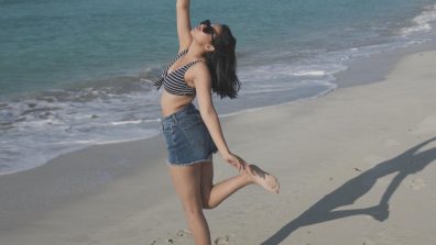 Reem Shaikh Slays Beach Fashion In Denim Short And Striped Bralette Top With A Chic Cowhat