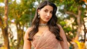 Nora Fatehi Shines in a Gorgeous Light Pink Saree, A Fashion Statement Like No Other 933173