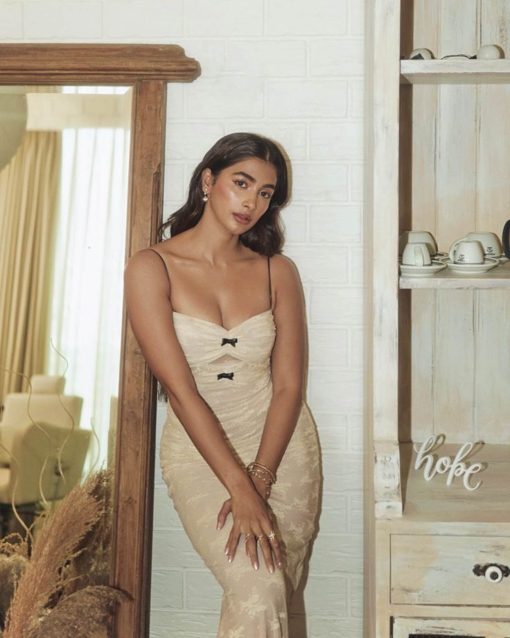 Pooja Hegde Stuns in a Chic Cream Bodycon Dress with Elegant Details 935101