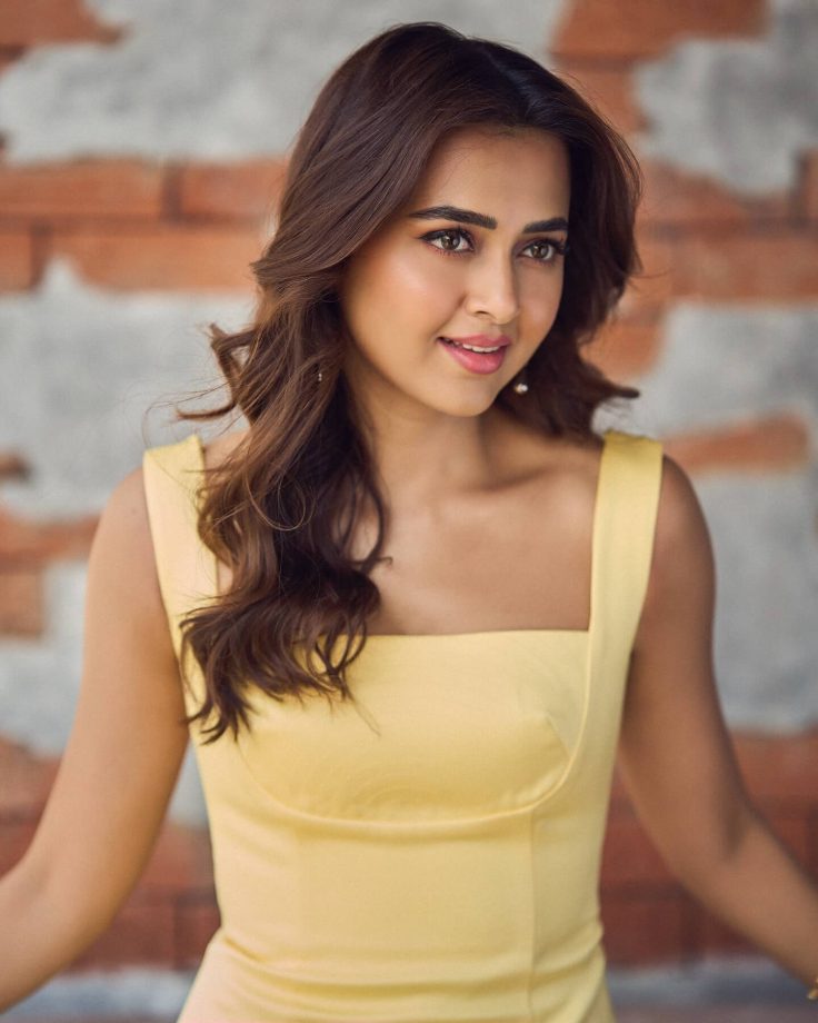 Tejasswi Prakash Stuns in a Fitted Yellow Dress with Flare 935139