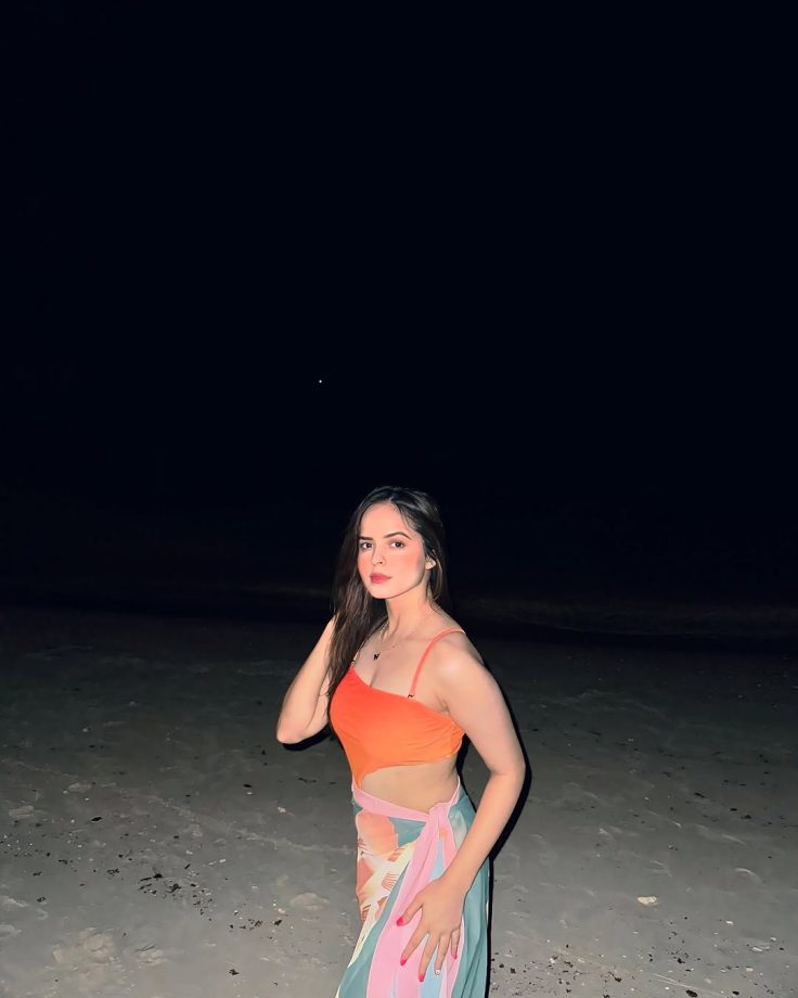 Palak Sindhwani Channels Mermaid Vibes in a Bold Orange Swimsuit by the Ocean 936181