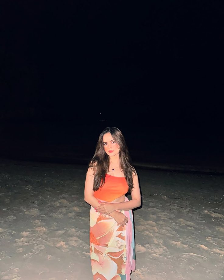 Palak Sindhwani Channels Mermaid Vibes in a Bold Orange Swimsuit by the Ocean 936182