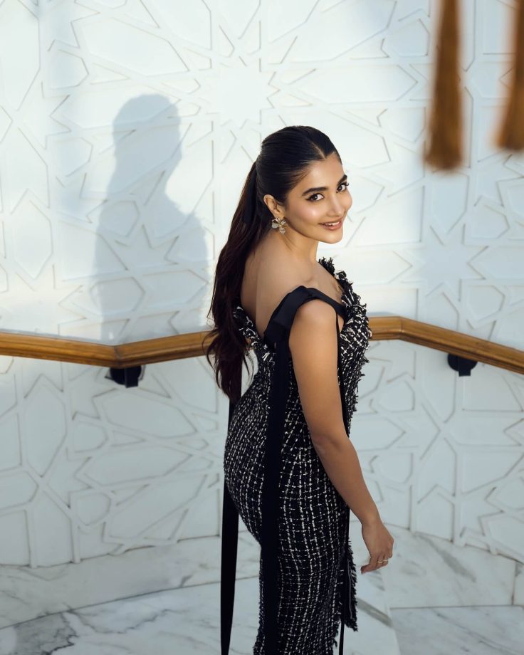 Pooja Hegde Shines in Black Bodycon Dress with Intricate White Threadwork and Bold Accessories 937069