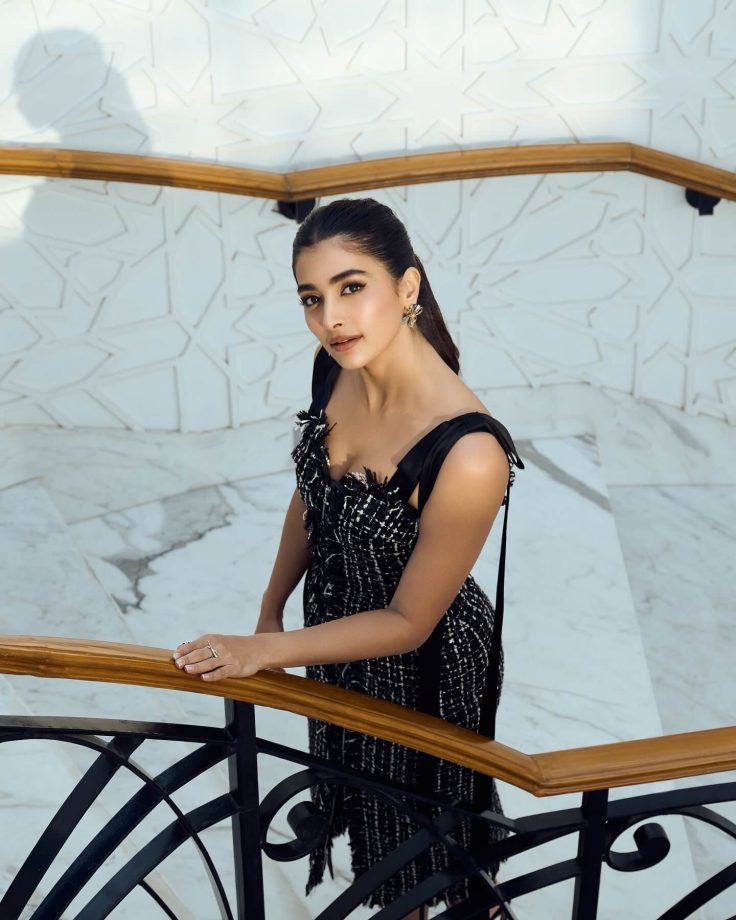 Pooja Hegde Shines in Black Bodycon Dress with Intricate White Threadwork and Bold Accessories 937068