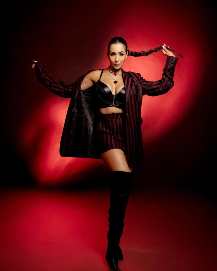 Malaika Arora's Bold Maroon and Black Look Screams Power and Glam 941663